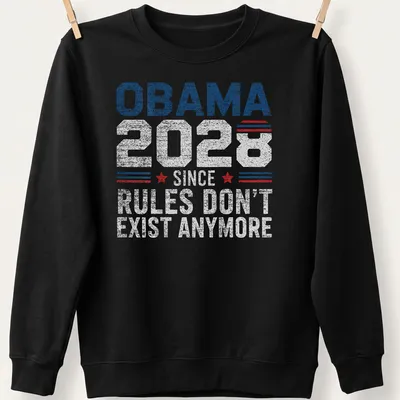 Retro distressed Obama 2028 shirt featuring bold text in red, white, and blue — printed on a unisex sweatshirt