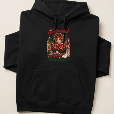 Colorful cartoon of a girl overwhelmed with Christmas decorations and humorous text above — printed on a unisex hoodie