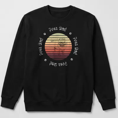 Retro sunset design featuring a cheerful Pomeranian with Pom Dad text — printed on a unisex sweatshirt