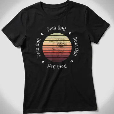 Retro sunset design featuring a cheerful Pomeranian with Pom Dad text — printed on a women's shirt