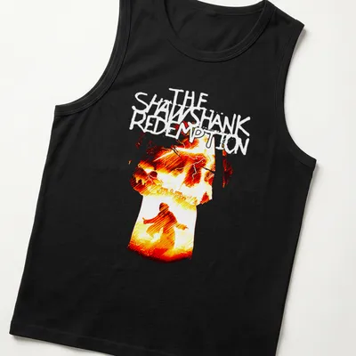 Silhouette of a person in fiery colors with dramatic illustration — printed on a tank top