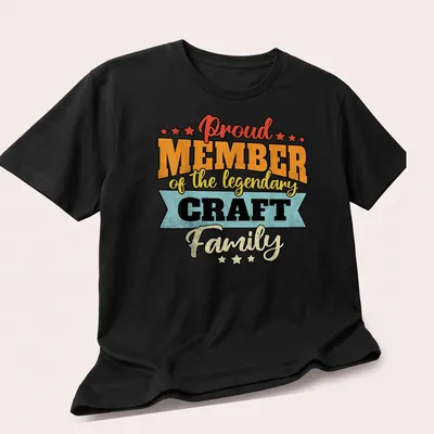 Vintage distressed t-shirt with text Proud Member of the Legendary Craft Family in bold colors — printed on a unisex t-shirt (angled view)