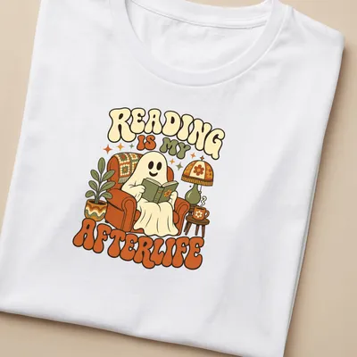 Retro-style T-shirt featuring a ghost reading a book with colorful text — printed on a women's shirt