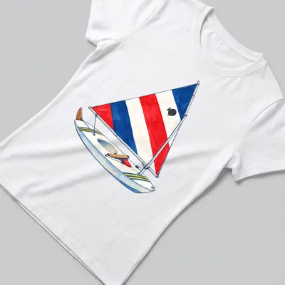Watercolor print of a red, white, and blue Sunfish sailboat on water — printed on a women's shirt