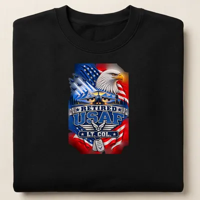 Patriotic T-shirt featuring an eagle and military aircraft with Retired USAF LT. COL. text — printed on a unisex sweatshirt