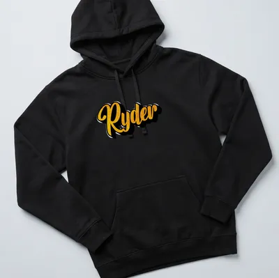 Personalized boys T-shirt with bold yellow script reading 'Ryder' on black — printed on a unisex hoodie