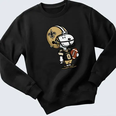 Snoopy in New Orleans Saints uniform with bold 'SAINTS' lettering — printed on a unisex sweatshirt