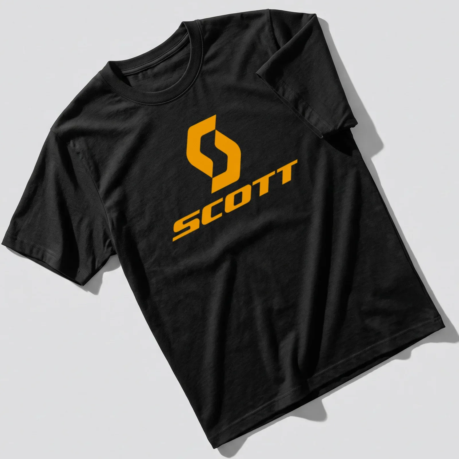 Modern SCOTT logo T-shirt in bright orange for cycling enthusiasts — printed on a unisex t-shirt