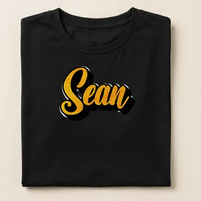 Bold script T-shirt featuring the name Sean in yellow on a black background — printed on a women's shirt