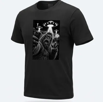 Realistic black and white print of Sasquatch taking a selfie with UFOs