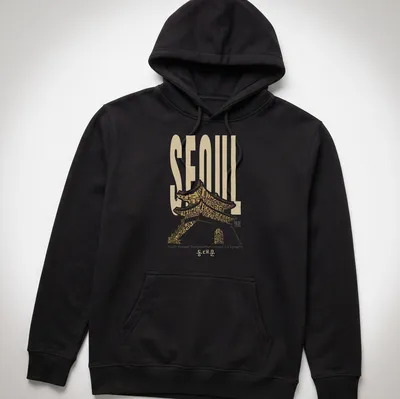 T-shirt featuring Hangul calligraphy of 'SEOUL South Korean Dongdaemun' with traditional architecture styling — printed on a unisex hoodie