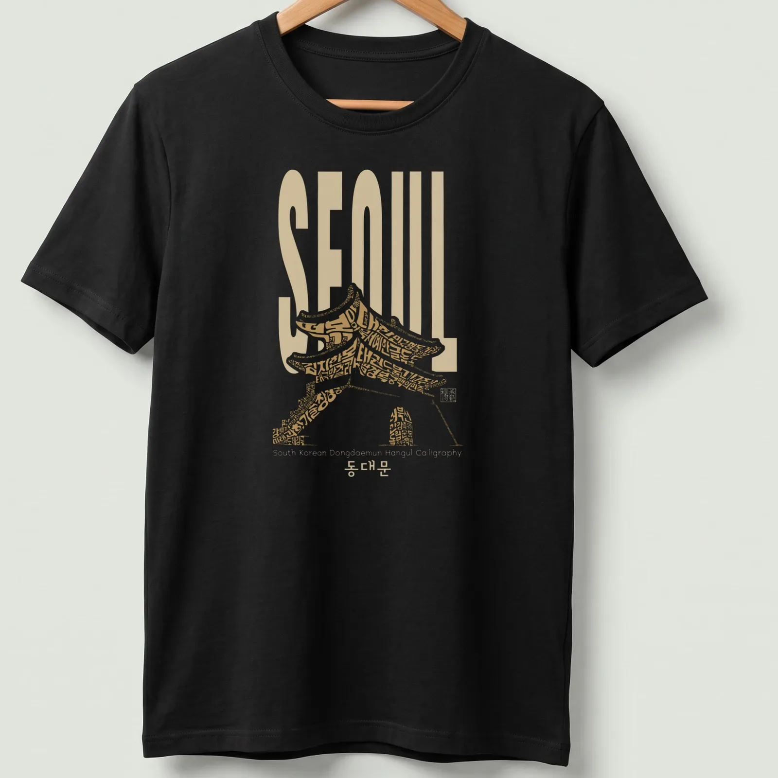T-shirt featuring Hangul calligraphy of 'SEOUL South Korean Dongdaemun' with traditional architecture styling — printed on a unisex t-shirt