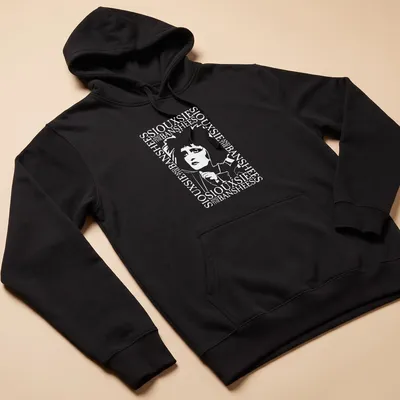 Black and white text border design featuring Siouxsie And The Banshees — printed on a unisex hoodie