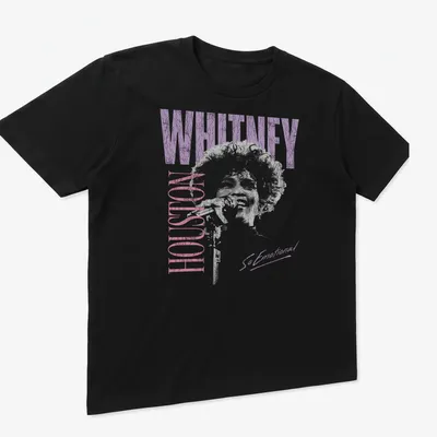 Distressed Whitney Houston T-shirt with tonal colors and emotional text — printed on a unisex t-shirt (angled view)