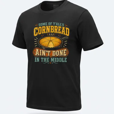Vintage T-shirt depicting a cast iron skillet of cornbread with humorous text.