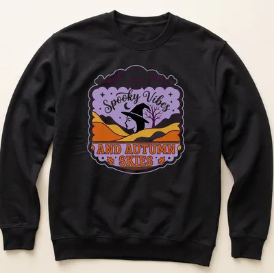 Vintage style T-shirt featuring witch silhouette and spooky vibes text in purple, orange, and black — printed on a unisex sweatshirt