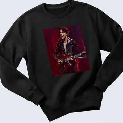 Illustration of a musician with a guitar in black, red, and grey. — printed on a unisex sweatshirt