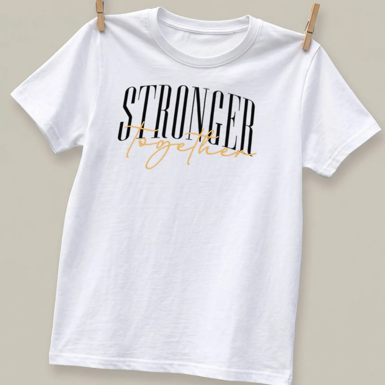 Elegant typography t-shirt featuring the phrase 'STRONGER together' in black, gold, and white. — printed on a unisex t-shirt