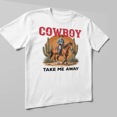 Realistic cowboy riding a horse in the desert with the text 'COWBOY TAKE ME AWAY' — printed on a unisex t-shirt (angled view)