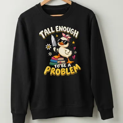 Cartoon duck graphic with the text 'Tall Enough To Be A Problem' in vibrant colors. — printed on a unisex sweatshirt