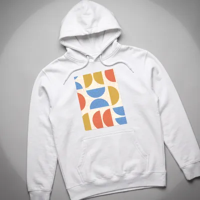 Modern geometric semicircles in cream, blue, red, and gold on — printed on a unisex hoodie