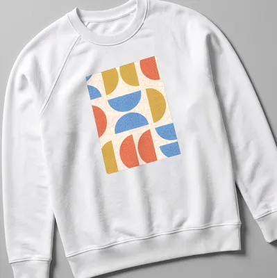 Modern geometric semicircles in cream, blue, red, and gold on — printed on a unisex sweatshirt