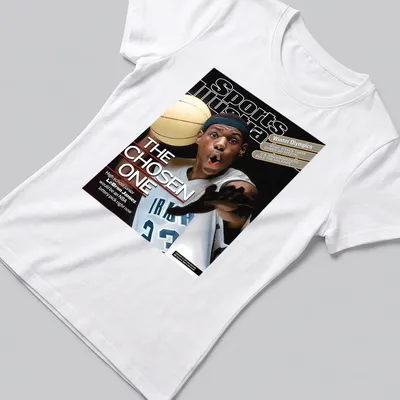 LeBron James Sports Illustrated T-shirt featuring 'THE CHOSEN ONE' text and vibrant colors. — printed on a women's shirt