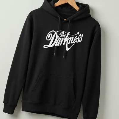 White cursive script 'The Darkness' with an arrow tail on a black — printed on a unisex hoodie