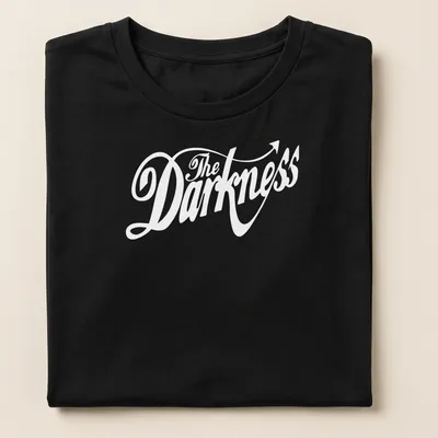 White cursive script 'The Darkness' with an arrow tail on a black — printed on a women's shirt