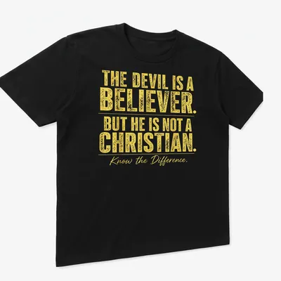 Bold typography t-shirt with the phrase about the devil's beliefs in yellow and white — printed on a unisex t-shirt (angled view)