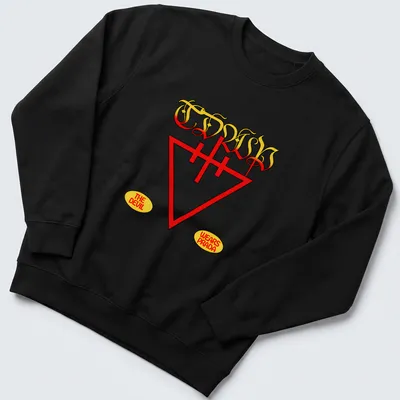 Vintage t-shirt featuring a stylized devil graphic and text 'The Devil Wears Prada' in red and yellow — printed on a unisex sweatshirt