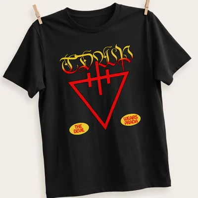 Vintage t-shirt featuring a stylized devil graphic and text 'The Devil Wears Prada' in red and yellow