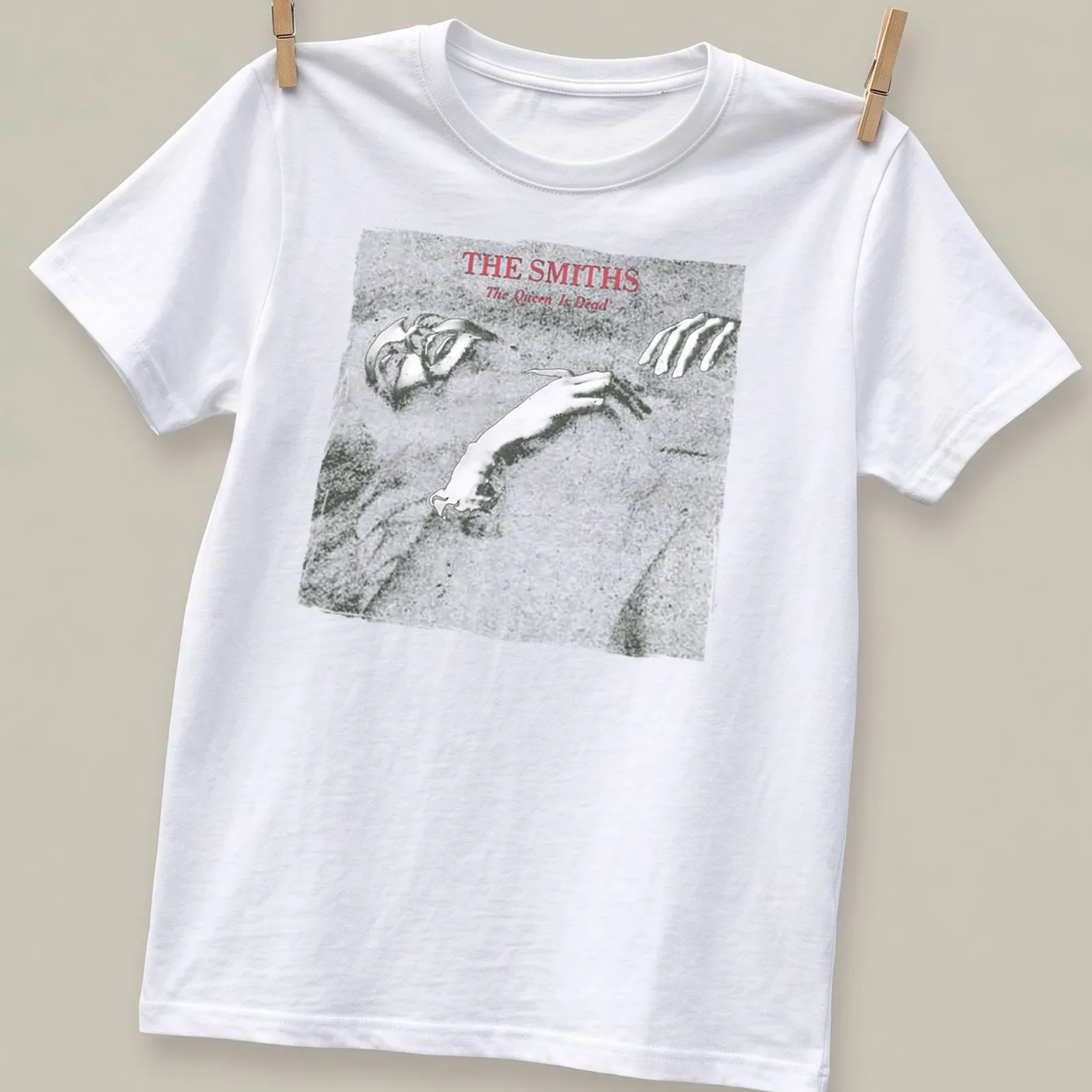 Vintage The Smiths album cover tee featuring black, white, and red colors — printed on a unisex t-shirt