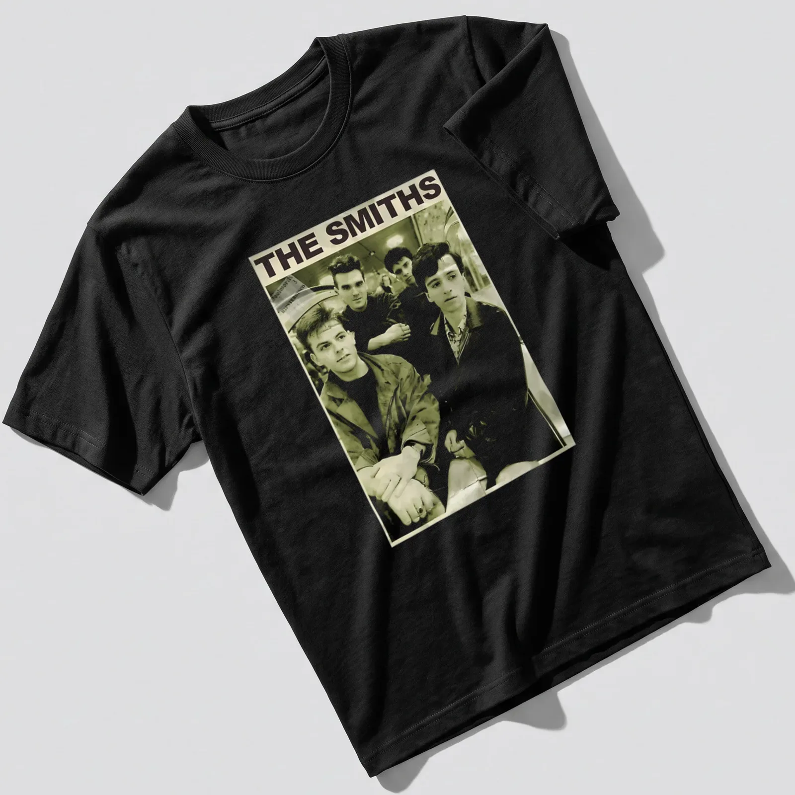 Sepia-toned portrait of The Smiths band members with their name in classic typeface. — printed on a unisex t-shirt