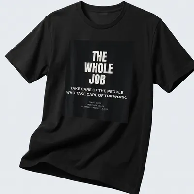 Bold typography featuring leadership coaching message on T-shirt