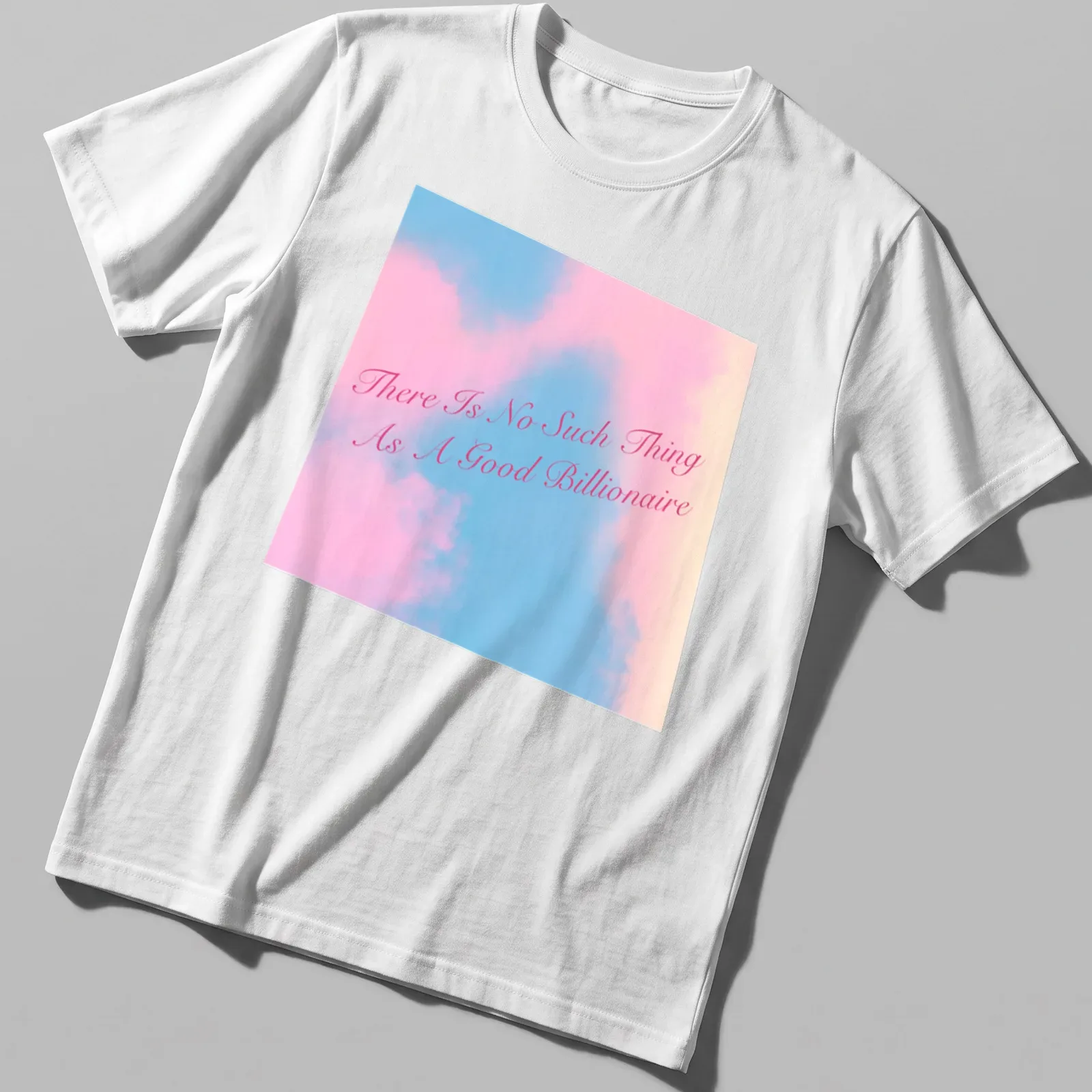 Modern script t-shirt featuring the text 'There Is No Such Thing As A Good Billionaire' in pink and light blue — printed on a unisex t-shirt