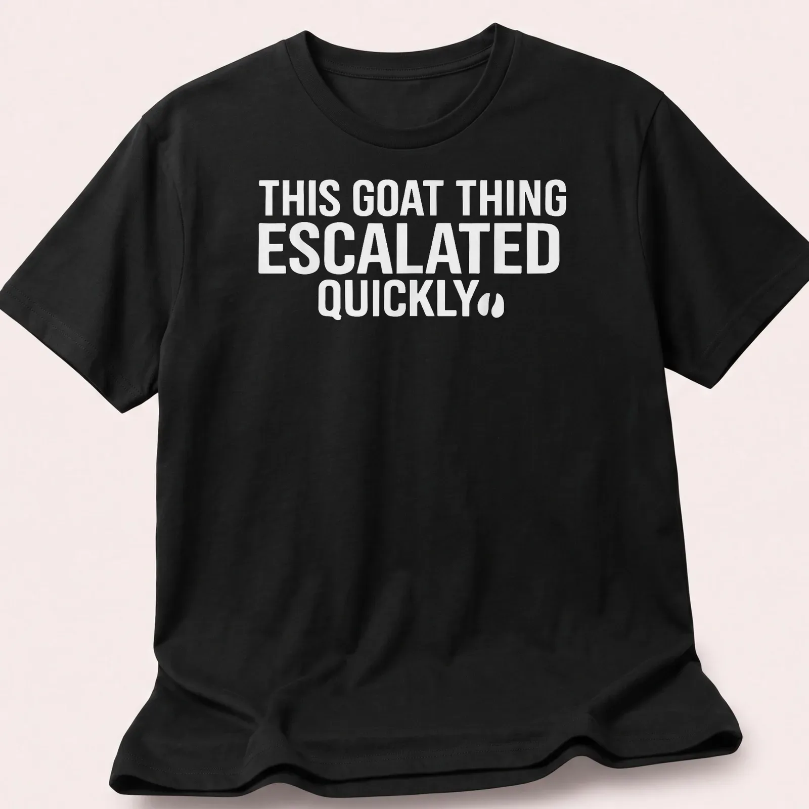 Bold typography saying 'THIS GOAT THING ESCALATED QUICKLY' on a white — printed on a unisex t-shirt