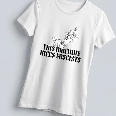 Bold line-art of Robin Hood with the phrase 'THIS MACHINE KILLS FASCISTS' in black and white — printed on a women's shirt