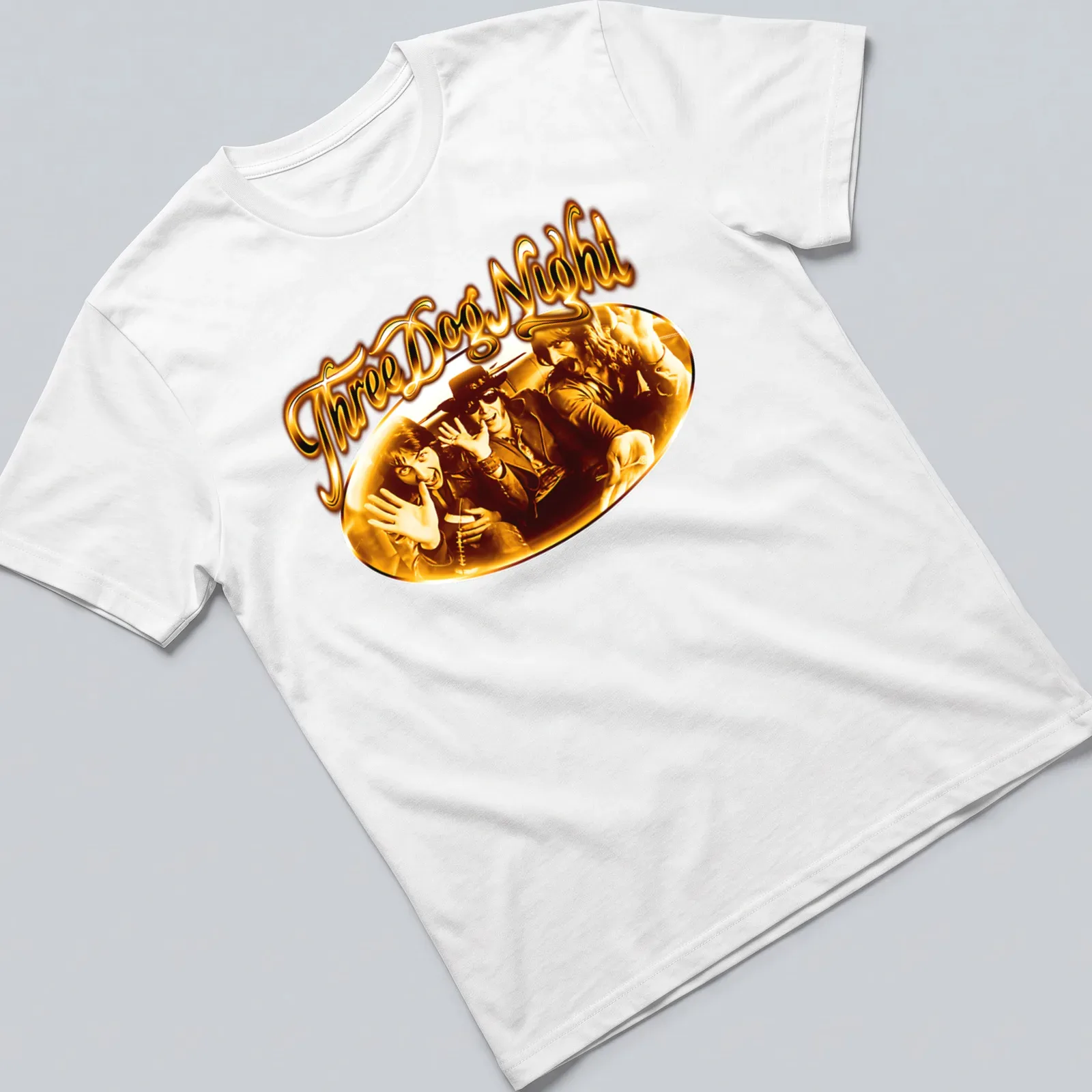 Vintage t-shirt featuring the band members of Three Dog Night in gold, brown, and black — printed on a unisex t-shirt