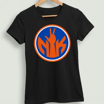 Bold typography t-shirt with a hand making a victory sign and Knicks colors. — printed on a women's shirt
