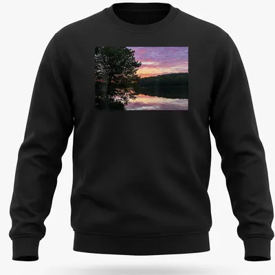 Photographic print of a serene lake at sunrise with colorful reflections and text. — printed on a unisex sweatshirt