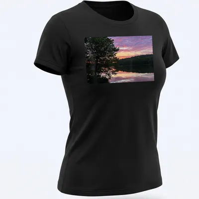 Photographic print of a serene lake at sunrise with colorful reflections and text. — printed on a women's shirt