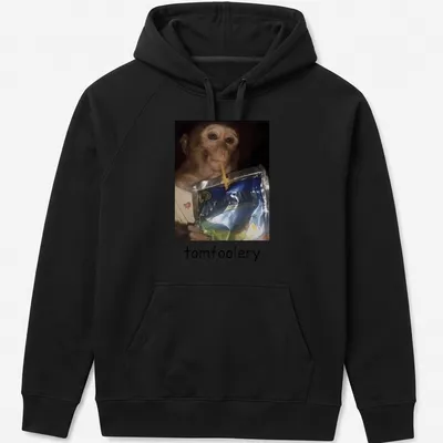 Realistic print of a monkey drinking juice from a pouch, featuring vibrant colors — printed on a unisex hoodie