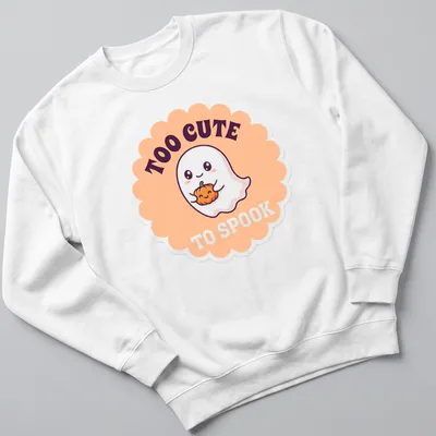 Kawaii ghost holding a pumpkin with text 'TOO CUTE TO SPOOK' — printed on a unisex sweatshirt