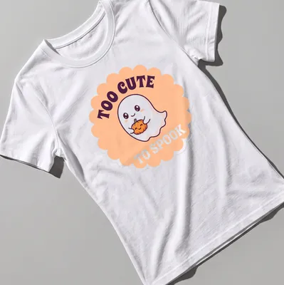 Kawaii ghost holding a pumpkin with text 'TOO CUTE TO SPOOK' — printed on a women's shirt