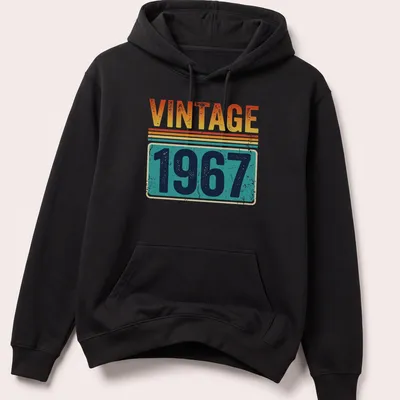 Distressed Vintage 1967 T-shirt with retro typography in orange, yellow, teal, navy, and white — printed on a unisex hoodie