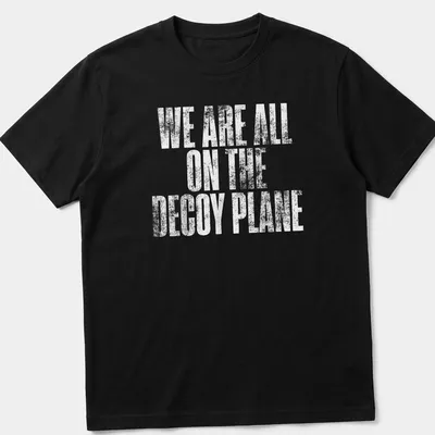 Distressed print of the phrase We Are All On The Decoy Plane in white