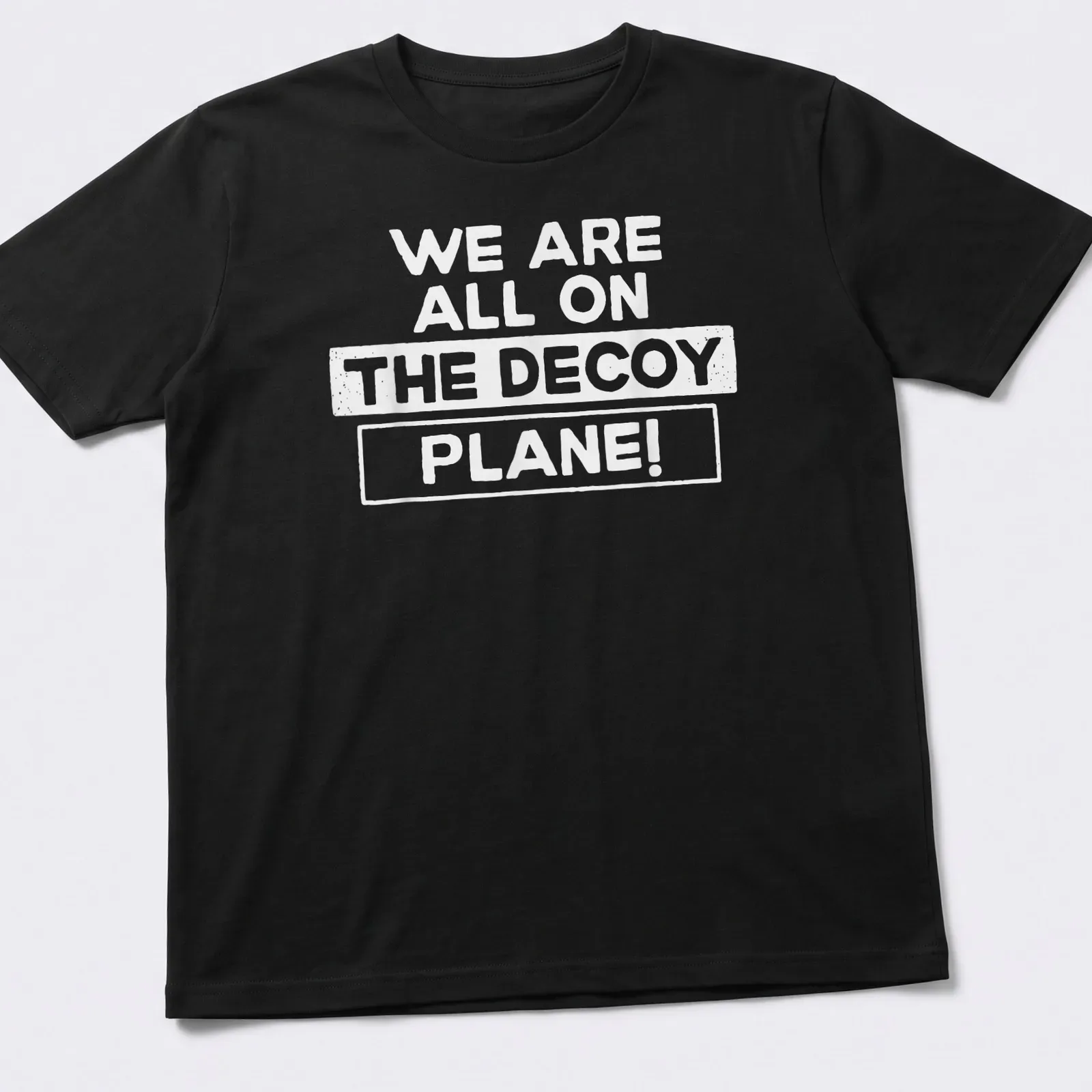 Bold typography T-shirt featuring the phrase We Are All On The Decoy Plane! — printed on a unisex t-shirt