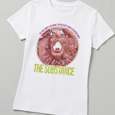 Distressed t-shirt featuring a screaming face and text about appreciation of experience — printed on a women's shirt