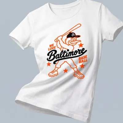 Cartoon Baltimore Oriole Bird illustration with WE LOVE Baltimore BASE BALL text — printed on a women's shirt